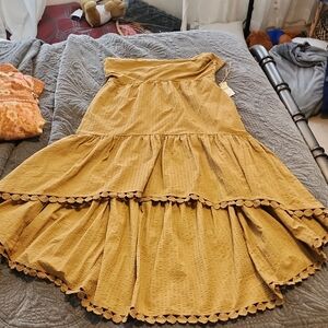 Maeve Elegant Mustard Tiered strapless dress